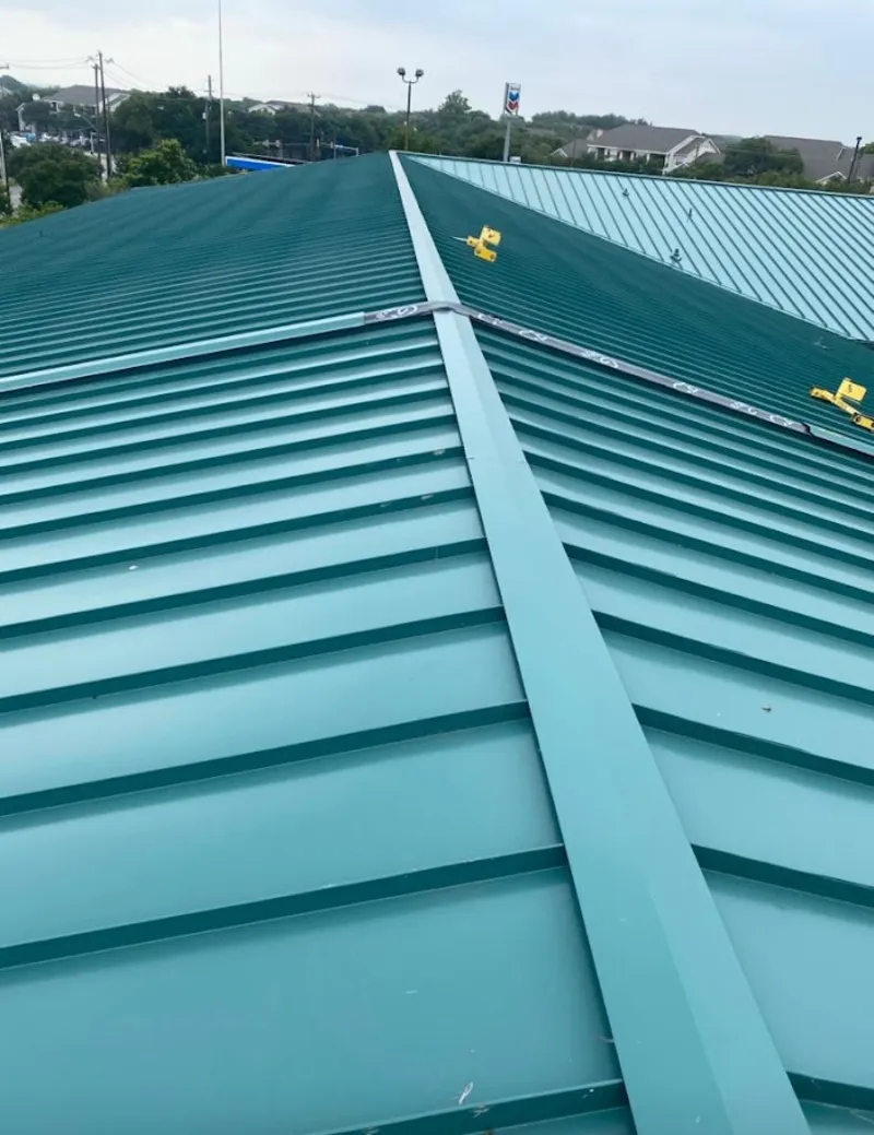 Green commercial metal roof ridge and valley for Metal Roof Repair in Bethany