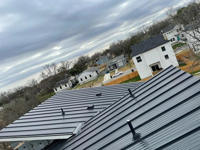 Standing seam metal roof panels with vents for Skylight Repair in Bethany